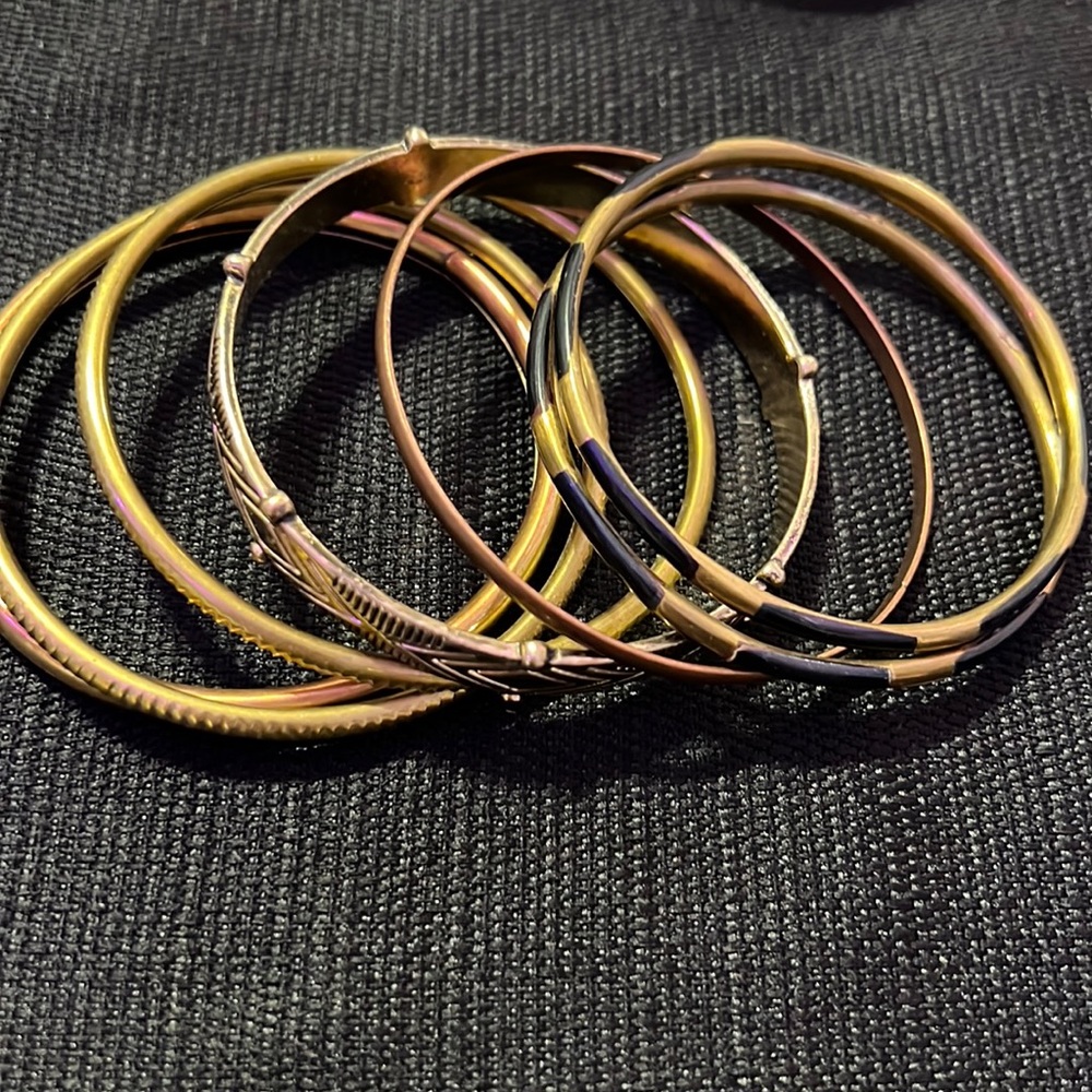 Claire’s gold burnished bangles